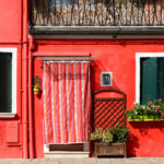 Red house on Burano island in Venice, Italy